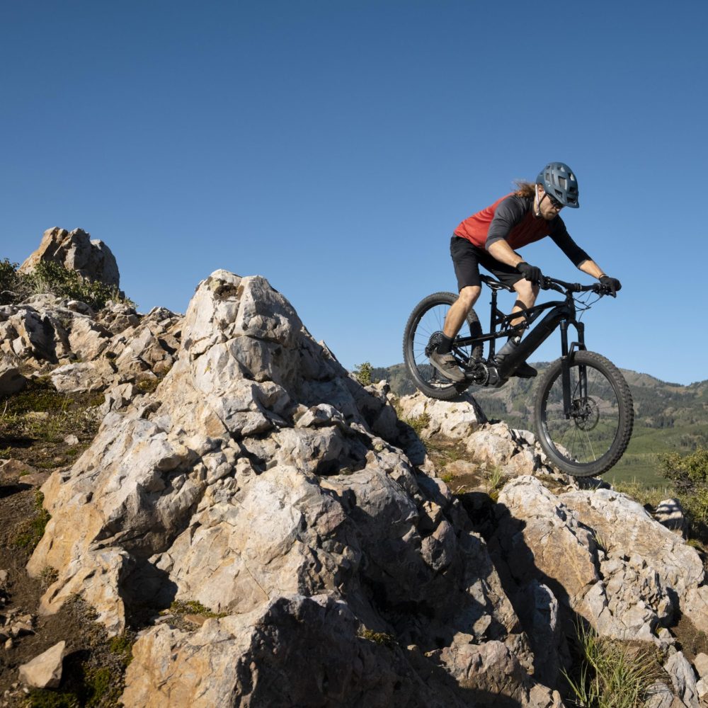 Thredbo 1380 Luxury Accomodation in Thredbo NSW, Australia Young Adult Using Electric Bike Country Side