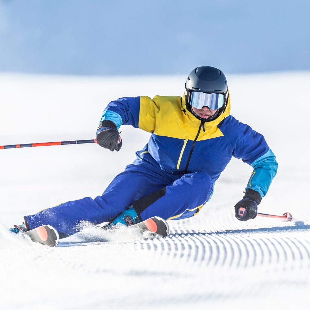 Thredbo 1380 Luxury Accomodation in Thredbo NSW, Australia A Young Aggressive Skier On An Alpine Slope Demonstrates An Extreme Carving Skiing Style.