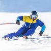 Thredbo 1380 Luxury Accomodation in Thredbo NSW, Australia A Young Aggressive Skier On An Alpine Slope Demonstrates An Extreme Carving Skiing Style.